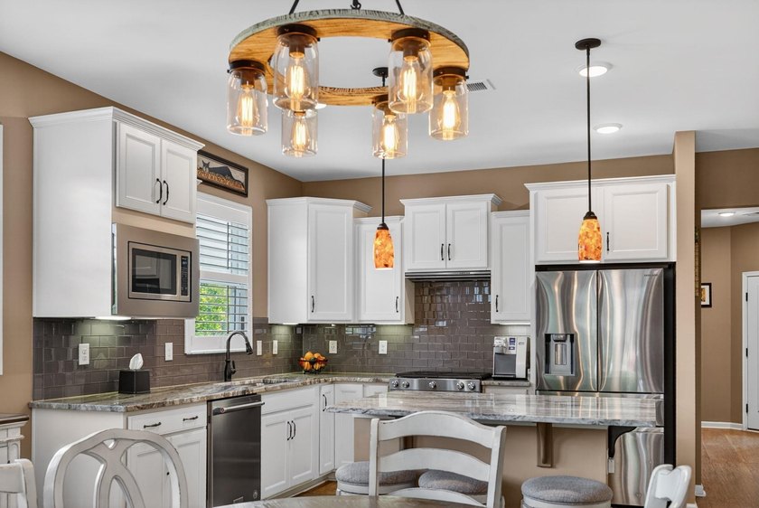 Welcome to Del Webb at Grande Dunes. This beautifully maintained - photo 8