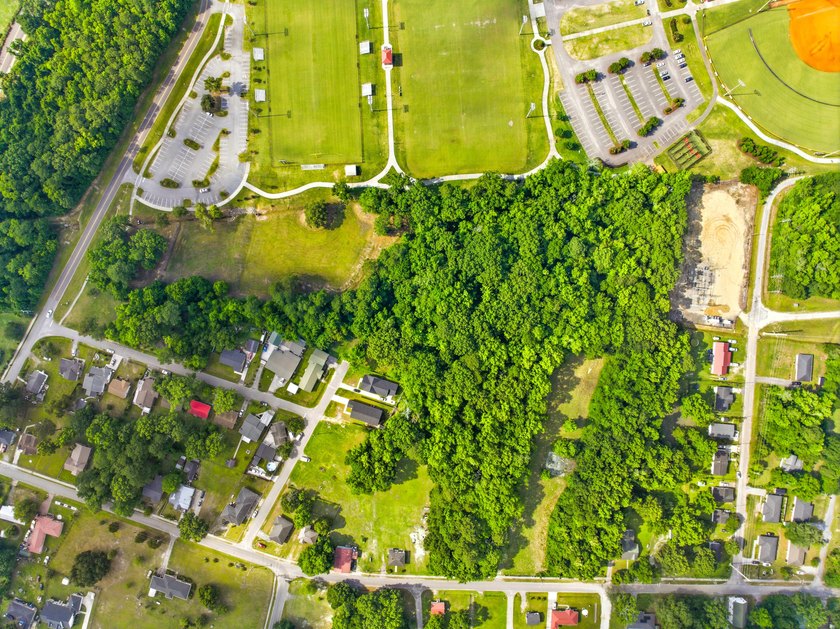Discover .81 acres of wooded privacy at the end of President - photo 11