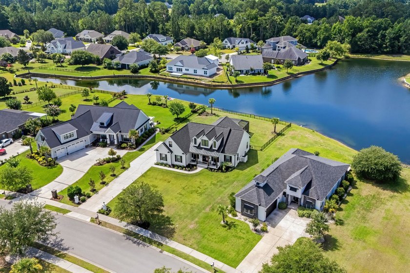 Welcome to 1312 Whooping Crane Drive! Designed for elevated - photo 3