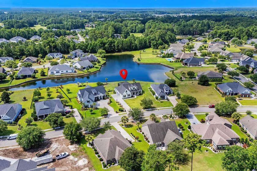 Welcome to 1312 Whooping Crane Drive! Designed for elevated - photo 4