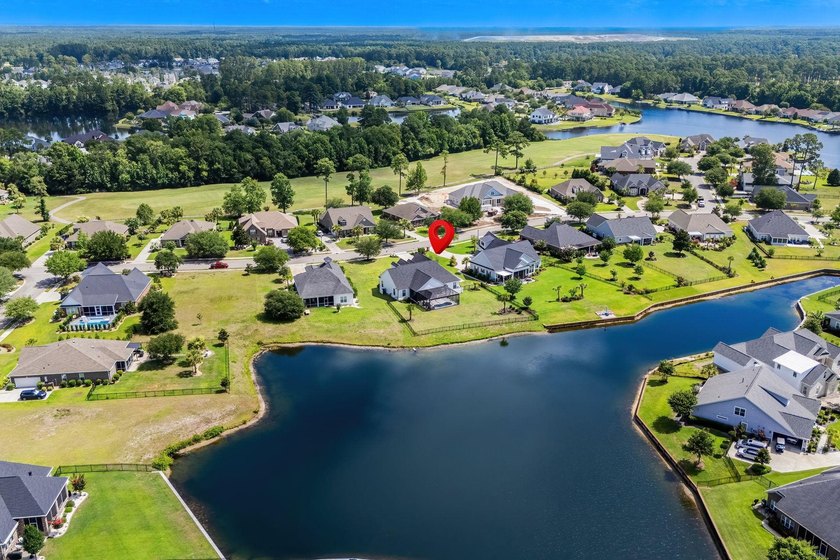 Welcome to 1312 Whooping Crane Drive! Designed for elevated - photo 5