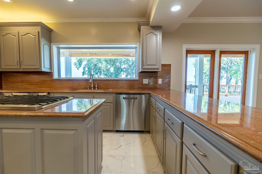 Experience true waterfront living in this stunning 4-bedroom - photo 22