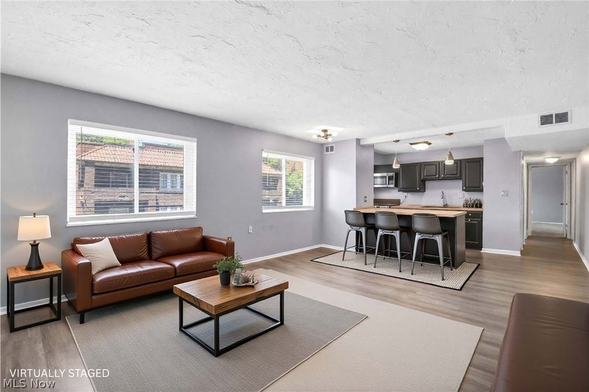 Prepare to be moved! This beautifully refreshed ranch-style - photo 2