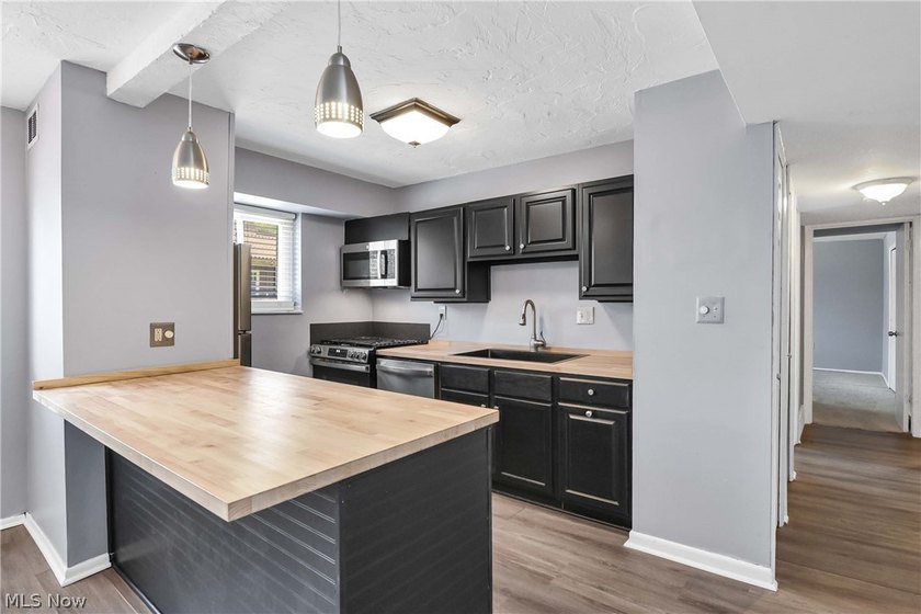 Prepare to be moved! This beautifully refreshed ranch-style - photo 4