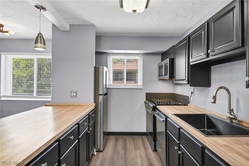 Prepare to be moved! This beautifully refreshed ranch-style - photo 10