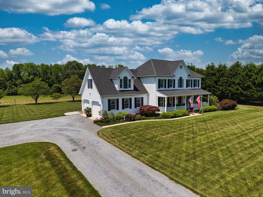 Welcome home to this Colonial-style home located in the highly - photo 2