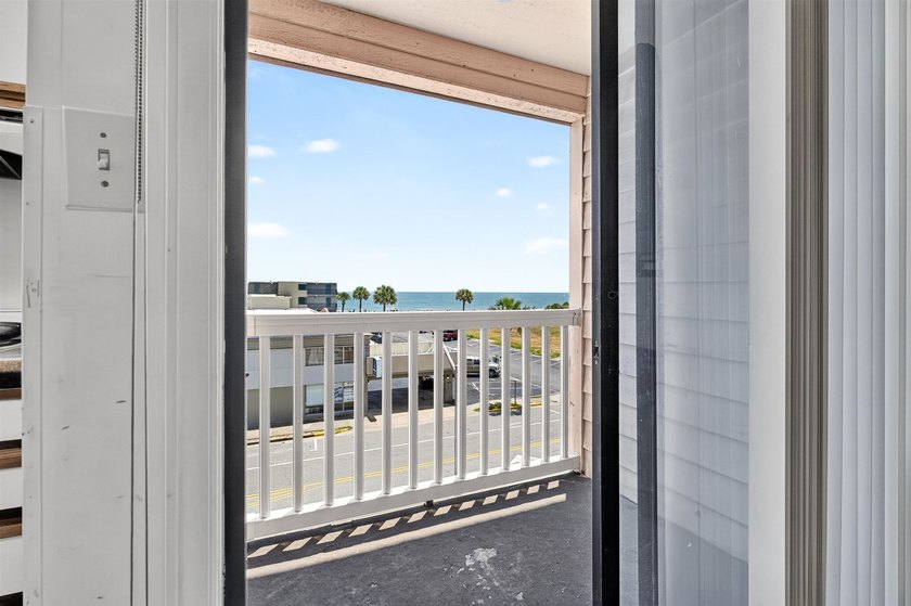 Ocean Views, End-Unit, and Opportunity! This end-unit condo at - photo 3
