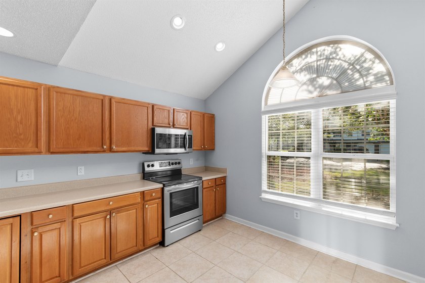 This spacious townhome features three bedrooms, two full baths - photo 6