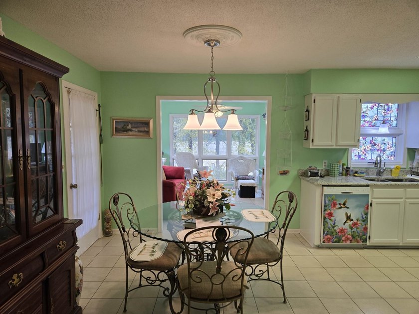 This is a wonderful home that sits on the marsh in Windjammer - photo 12
