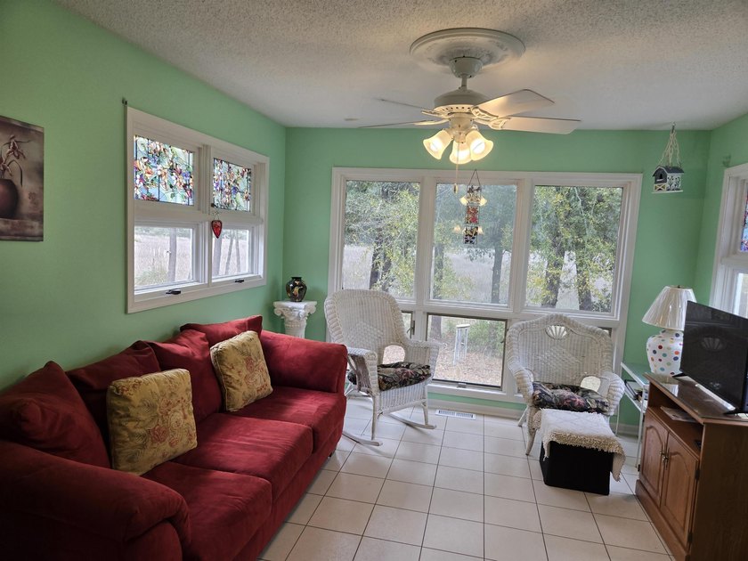 This is a wonderful home that sits on the marsh in Windjammer - photo 14