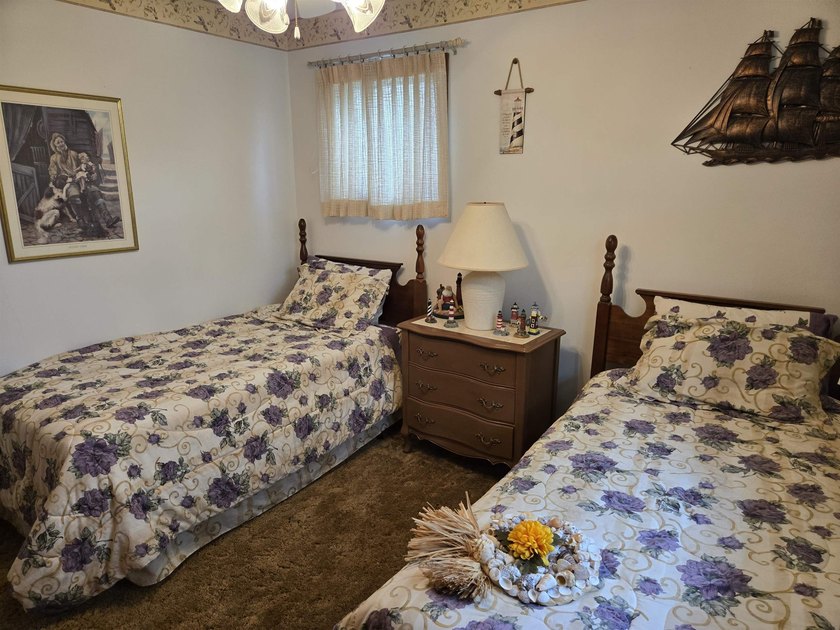 This is a wonderful home that sits on the marsh in Windjammer - photo 27
