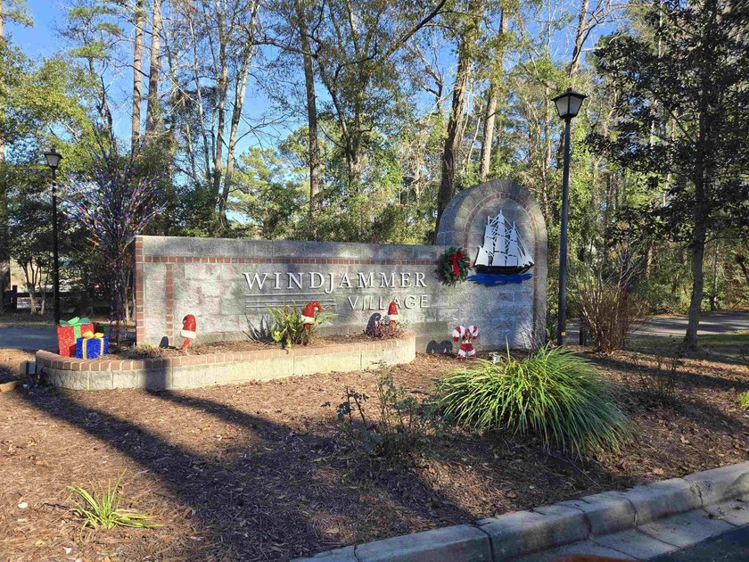 This is a wonderful home that sits on the marsh in Windjammer - photo 40