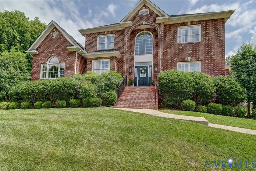 Welcome to this beautifully maintained brick-front home in the - photo 3