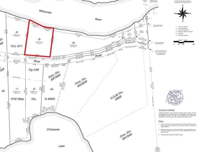 This 1.16-acre wooded parcel with 210 feet of frontage on the - photo 2