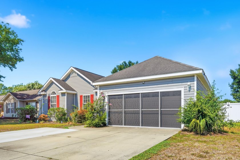 Welcome to this charming 3-bedroom, 2-bath home offering an - photo 3