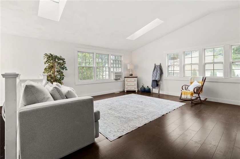 Tucked away in a peaceful setting, this three-bedroom - photo 3