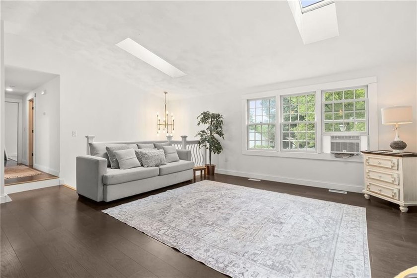 Tucked away in a peaceful setting, this three-bedroom - photo 5