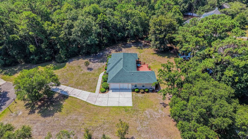 This home was custom-built by Dumont Brothers in 2004 and has - photo 4