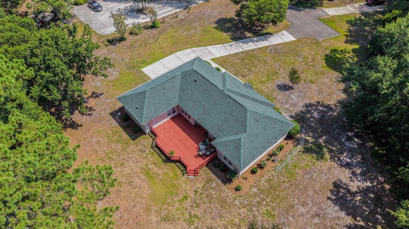 This home was custom-built by Dumont Brothers in 2004 and has - photo 5