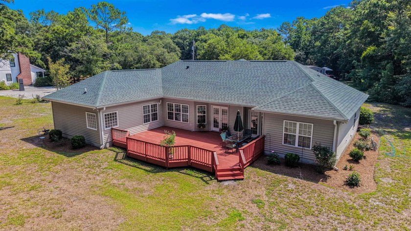 This home was custom-built by Dumont Brothers in 2004 and has - photo 6