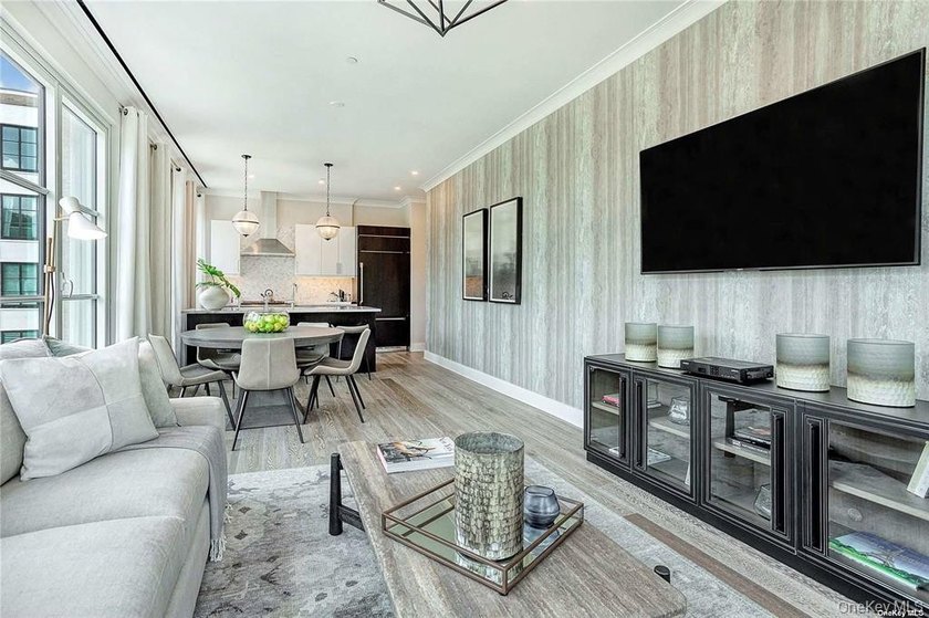 This bright two bedroom, two bathroom corner home features 10' - photo 3
