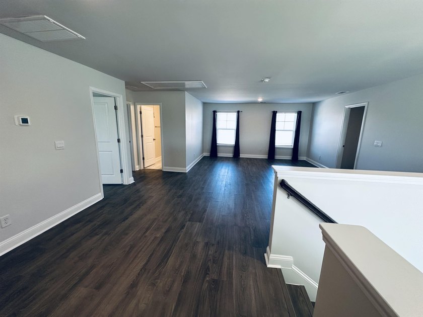 This Westerly home is a unique plan with a formal living and - photo 10