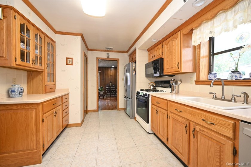 Welcome to this charming single-family residence nestled on a - photo 5