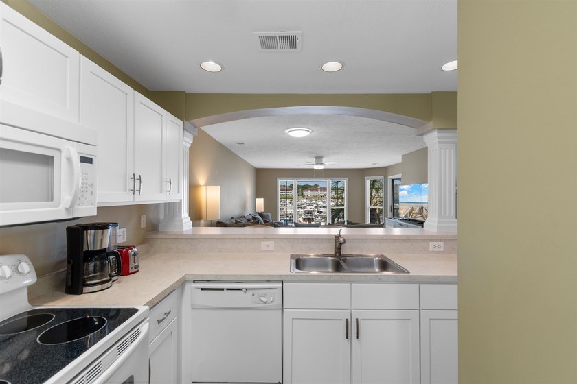 Wake up to beautiful marina views from this partially furnished - photo 8