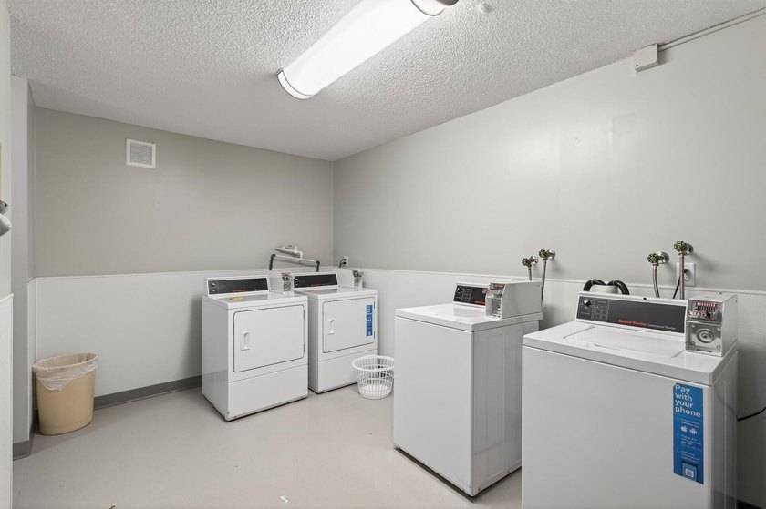 Welcome to this stylish and conveniently located condo in the - photo 26