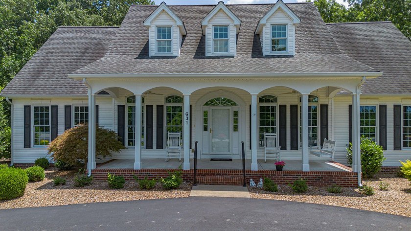 This elegant custom-built home is situated on 1.1 beautifully - photo 3