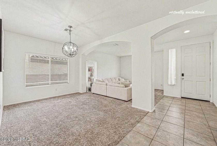 Welcome to your new home in the highly sought-after gated - photo 3