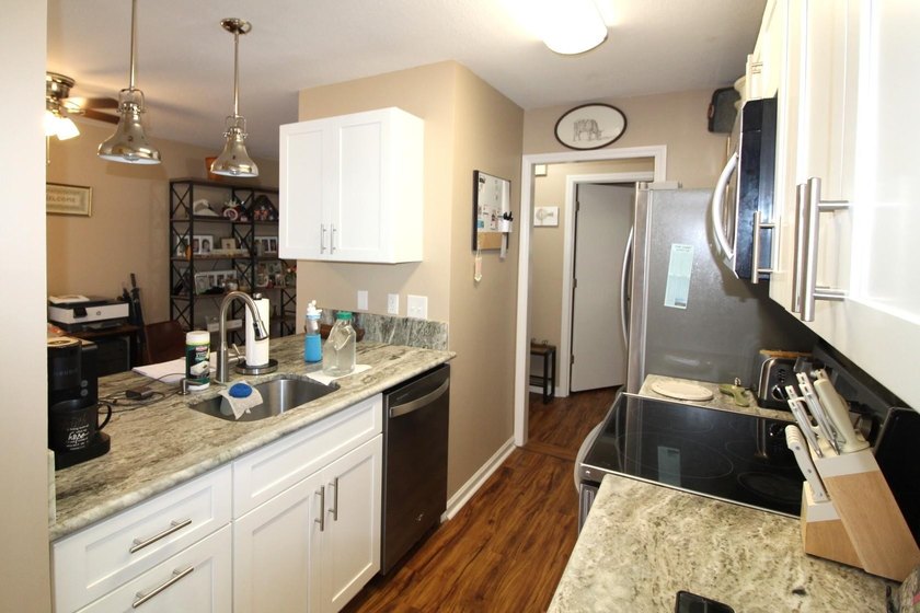 This ground floor 2BR/2BA, end-unit is located in the Tall Oaks - photo 9