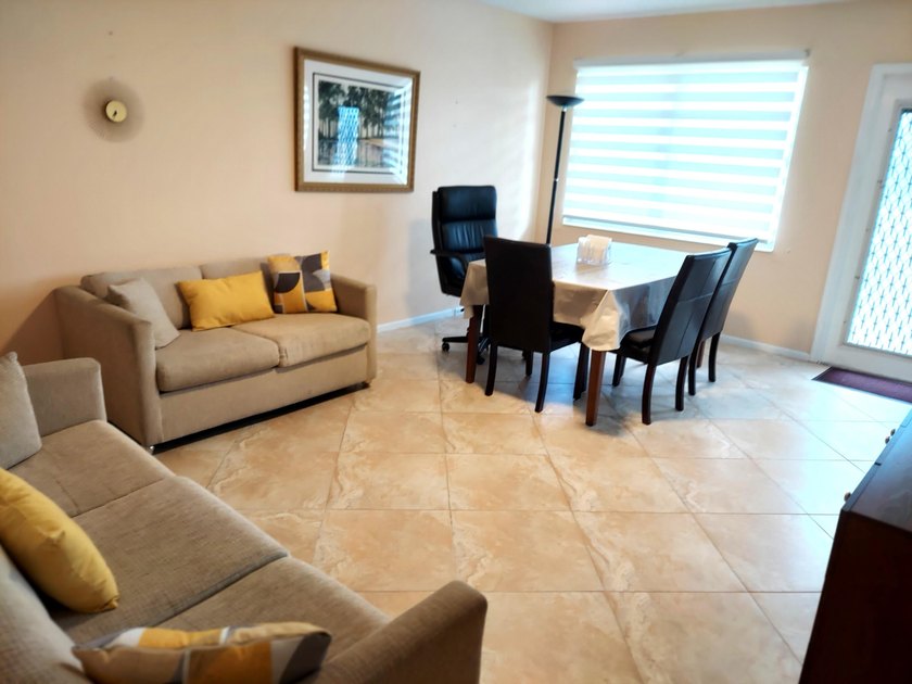 LOVELY 2 BEDROOM OVERLOOKING A HUGE LAKE W/FOUNTAIN! TILE FLOWS - photo 31