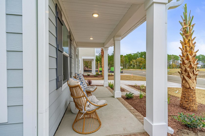 Experience the best of low maintenance living and coastal luxury - photo 3