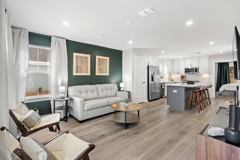 Experience the best of low maintenance living and coastal luxury - photo 5