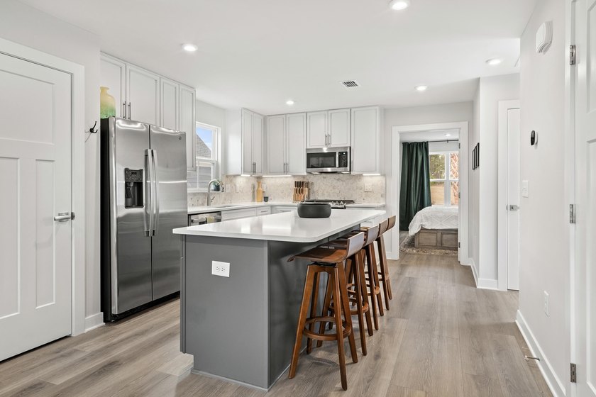 Experience the best of low maintenance living and coastal luxury - photo 9