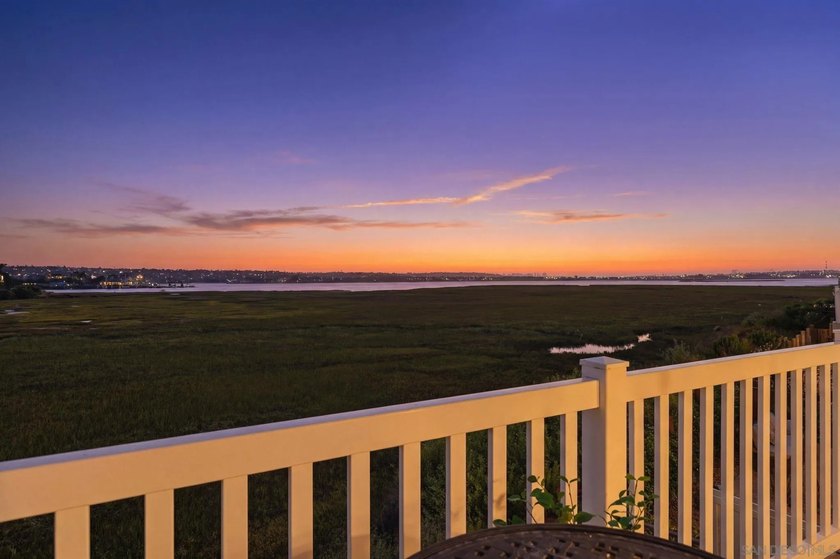 Wake each morning to the gentle shimmer of Mission Bay, where - photo 4