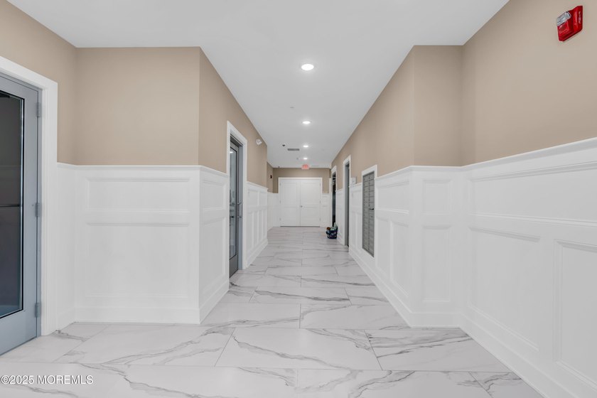 Welcome to The Reef, a 23-unit apartment building completed in - photo 3