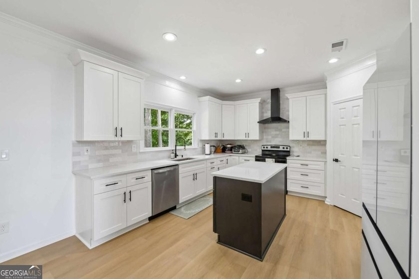 Completely renovated in 2025, this move-in-ready home is located - photo 12