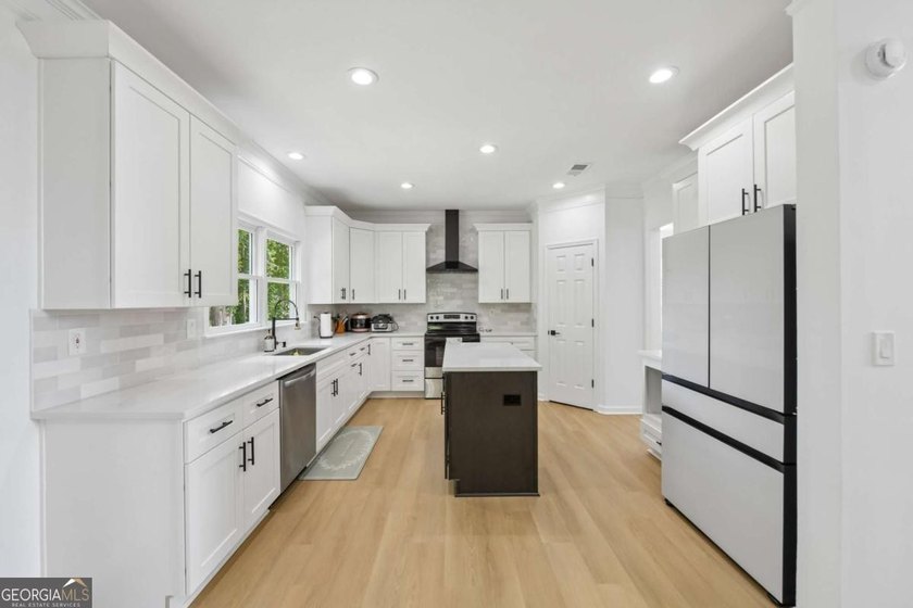 Completely renovated in 2025, this move-in-ready home is located - photo 13