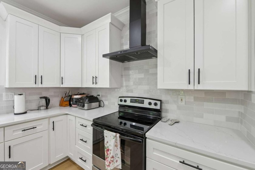 Completely renovated in 2025, this move-in-ready home is located - photo 17