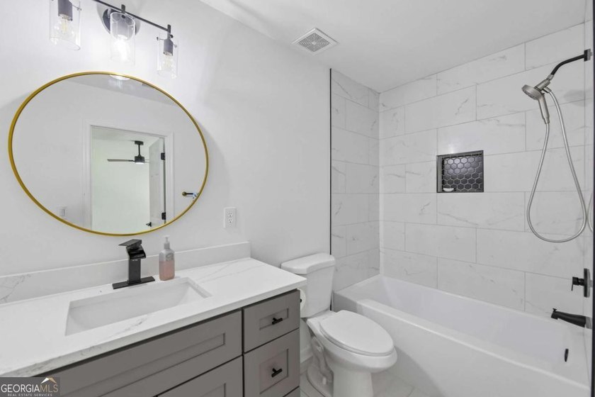 Completely renovated in 2025, this move-in-ready home is located - photo 31