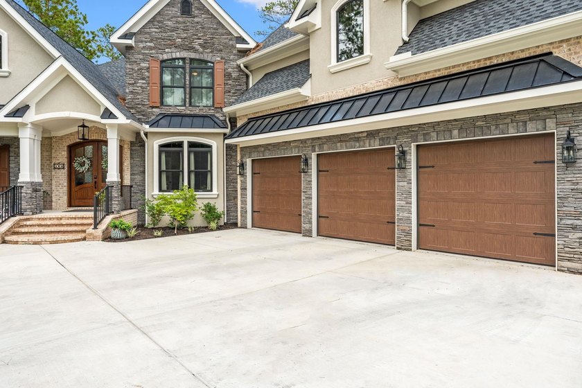Nestled on 1.5 acres in Bellwood Landing, this custom-built home - photo 2
