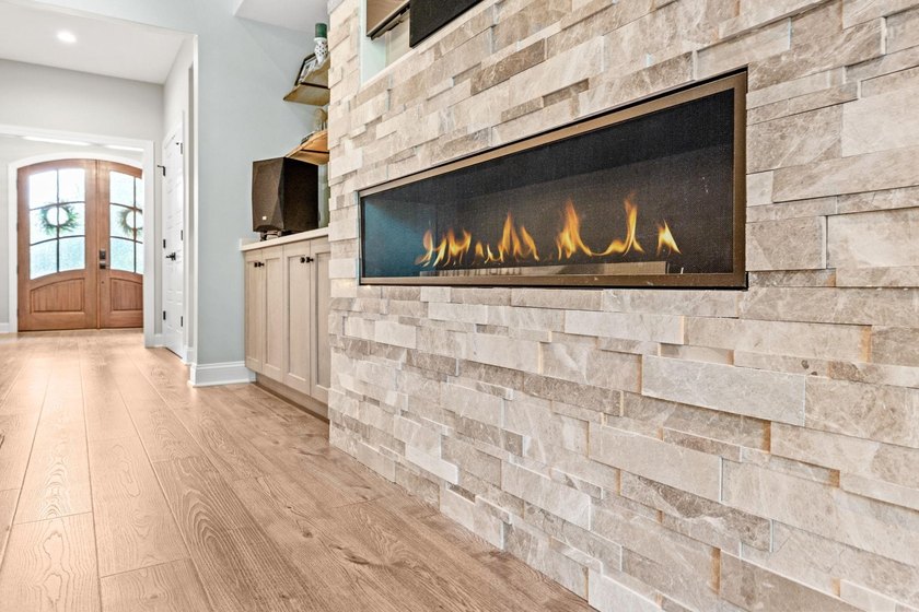 Nestled on 1.5 acres in Bellwood Landing, this custom-built home - photo 6