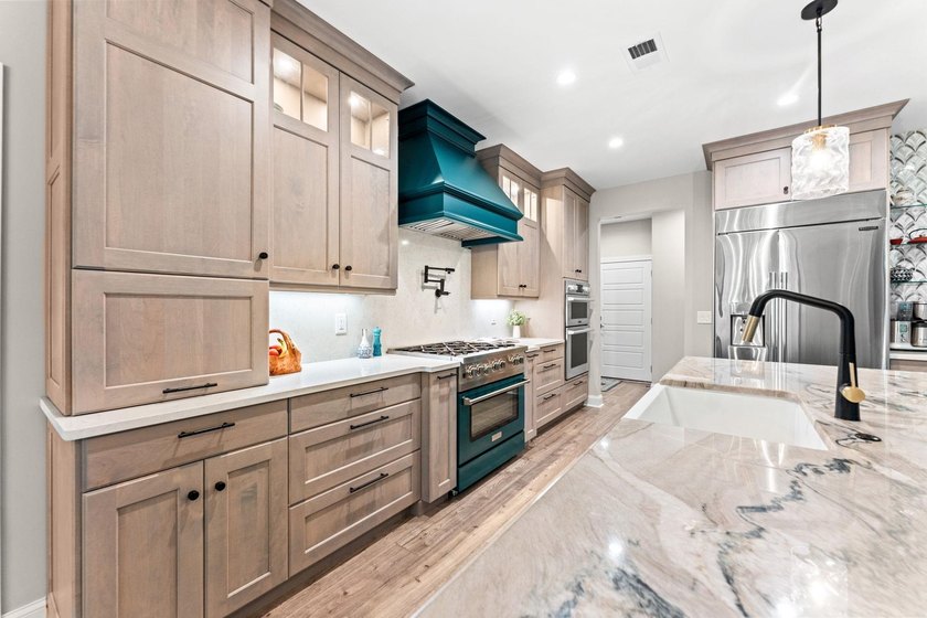 Nestled on 1.5 acres in Bellwood Landing, this custom-built home - photo 8