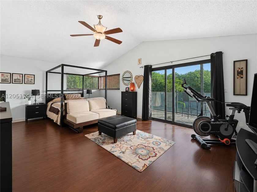 Tucked behind a private, palm-lined entrance in sought-after - photo 15