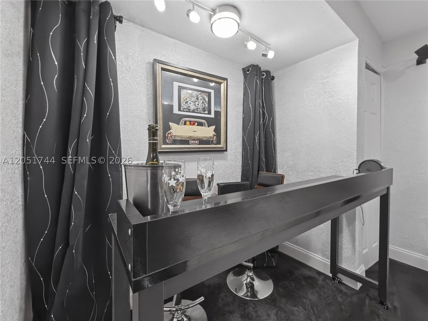 Tucked behind a private, palm-lined entrance in sought-after - photo 36