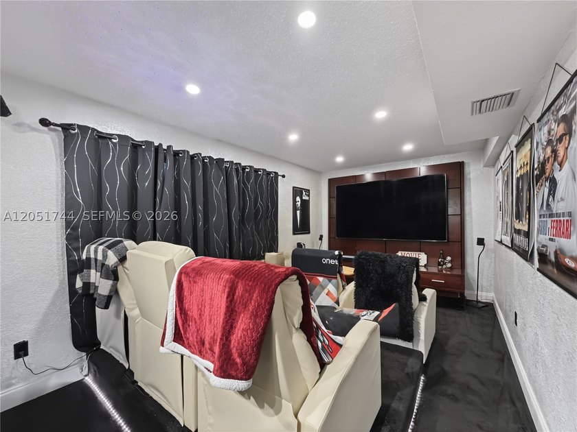 Tucked behind a private, palm-lined entrance in sought-after - photo 38