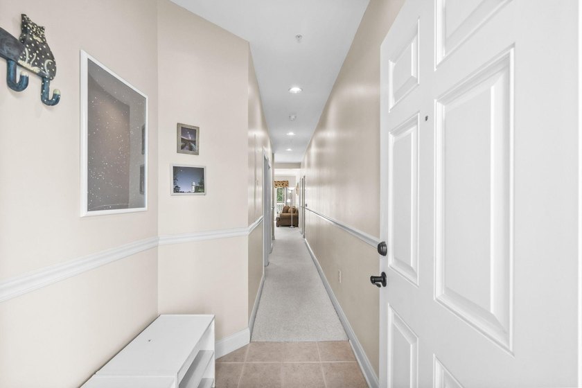 Welcome to Unit 202, a beautifully maintained 2-bedroom - photo 2