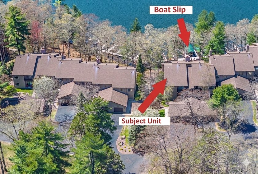 Experience exceptional Northwoods lakefront living with this - photo 2
